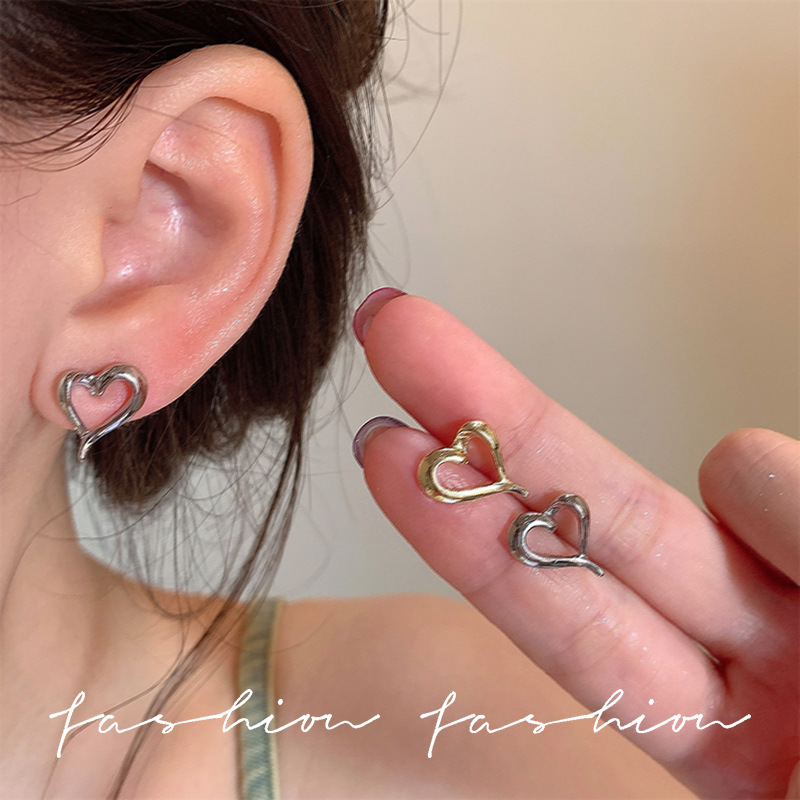 Silver niche hollowed-out heart-shaped stud earrings 2025 new bestseller, a light luxury and high-end design for women details Picture