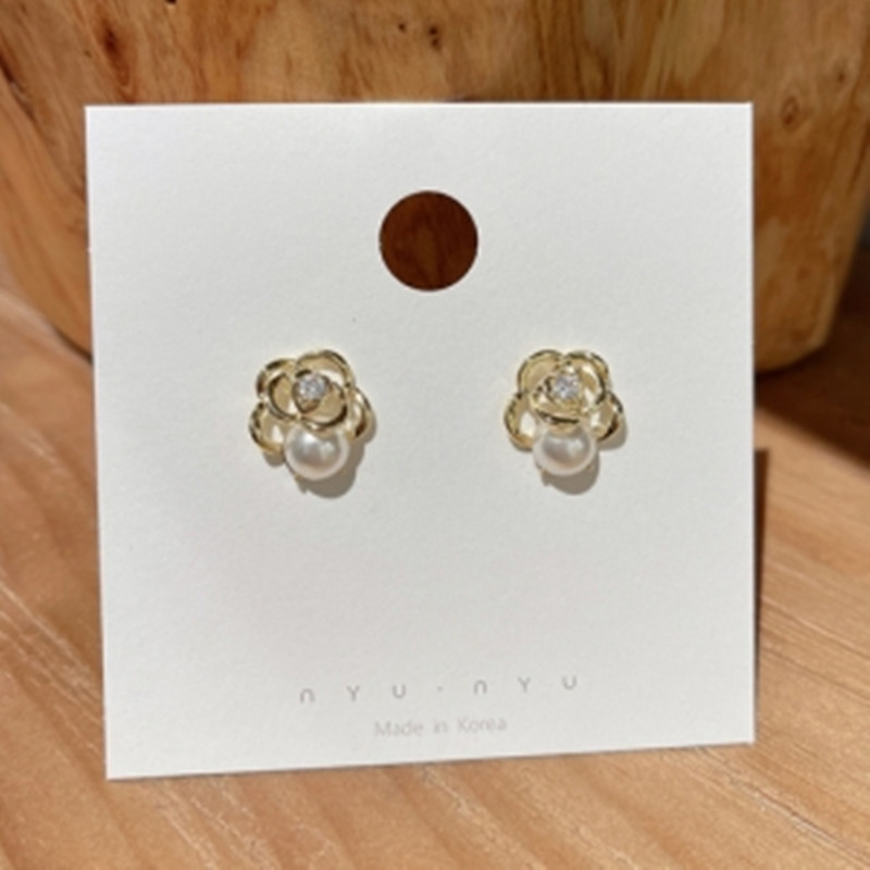 S925 Silver Needle Korean niche design sense light luxury pearl three-dimensional hollowed-out new trendy French camellia stud earrings details Picture