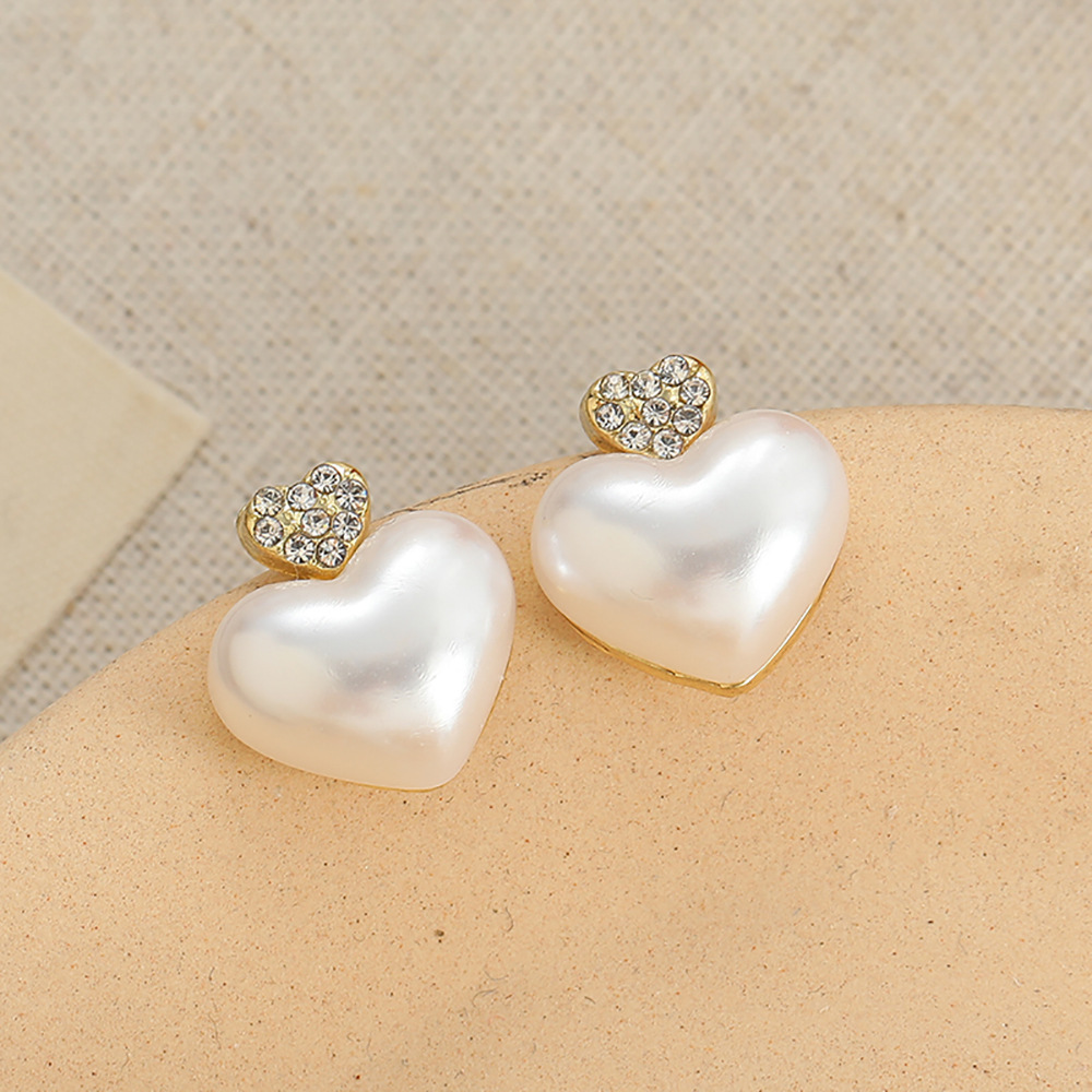 New pure silver pearl stud earrings and flower earrings for women, with a unique design sense, are light luxury earrings that are fresh and sweet Specification drawing