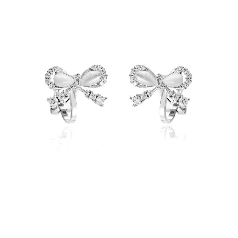 French-style zirconium cat's eye stone bow earrings for women, a light luxury, niche and high-end look. Simple, fashionable and versatile earrings Item Picture