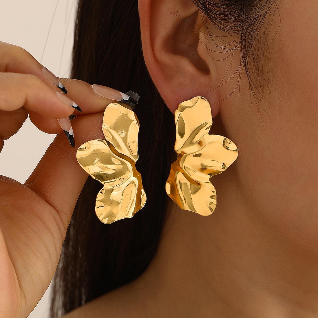 Cross-border best-selling golden flower ear studs, symmetrical, simple and irregular petal ear studs full figure