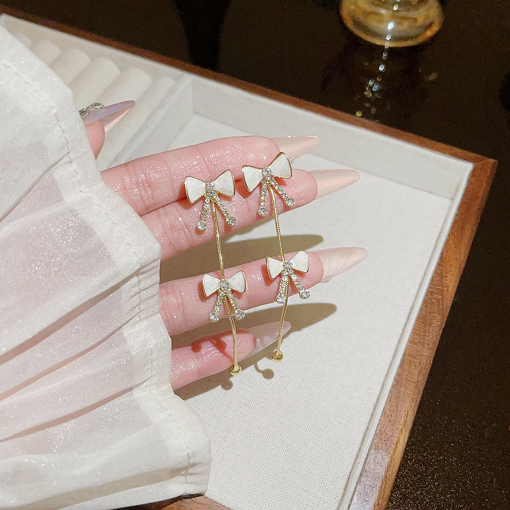 Long tassel and elegant bow earrings, light luxury and high-end fashion earrings, delicate and cold style stud accessories for women Specification drawing