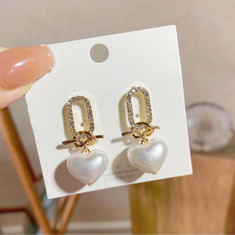 New trendy, simple and three-dimensional knotted heart-shaped pearl earrings for women, s925 silver needle, fashionable and popular earrings full figure