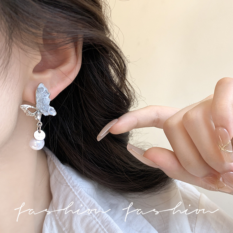 Asymmetrical butterfly crystal pearl tassel earrings, high-end and elegant new earrings S925 silver needle stud earrings for women Application Scenario