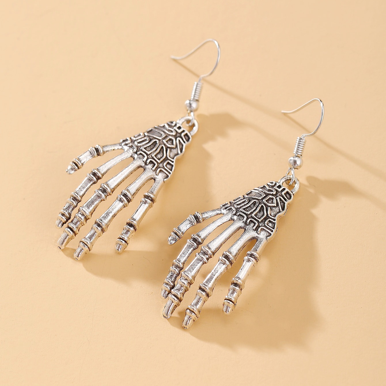Creative Halloween-themed stud earrings, personalized alloy festival ear hooks, exaggerated horror ghost skull palm earrings full figure