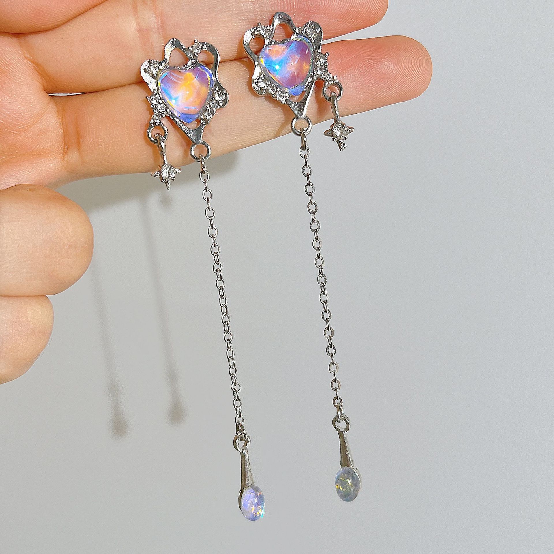 Cross-border niche heart-shaped four-pointed star tassel earrings, cold style light luxury earrings, long tassel imitation pearl women's ear clips details Picture