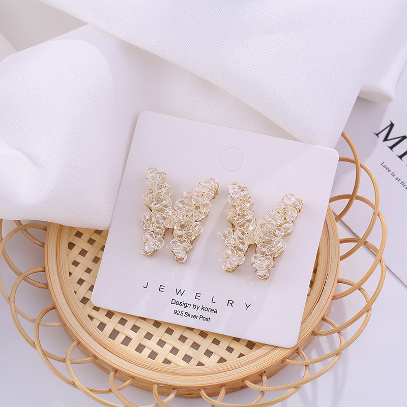 S925 Silver needle hand-woven sparkling pearl butterfly earrings, simple and elegant Korean stud earrings for women Application Scenario
