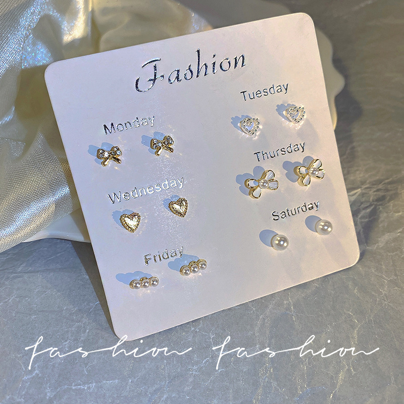 Super fairy-like small white stud earrings set, women's bow, star heart ear care stud earrings and earrings wholesale full figure