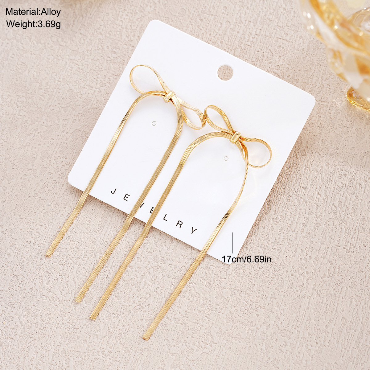 Cross-border new fashionable, simple and elegant long bow tassel earrings, niche, exaggerated and personalized earrings wholesale for women Specification drawing