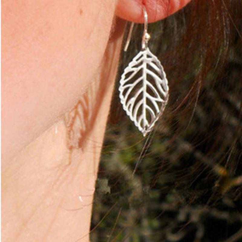 European and American cross-border jewelry, fashionable and elegant, versatile retro hollowed-out earrings for women, simple forest-style metal leaf earrings details Picture
