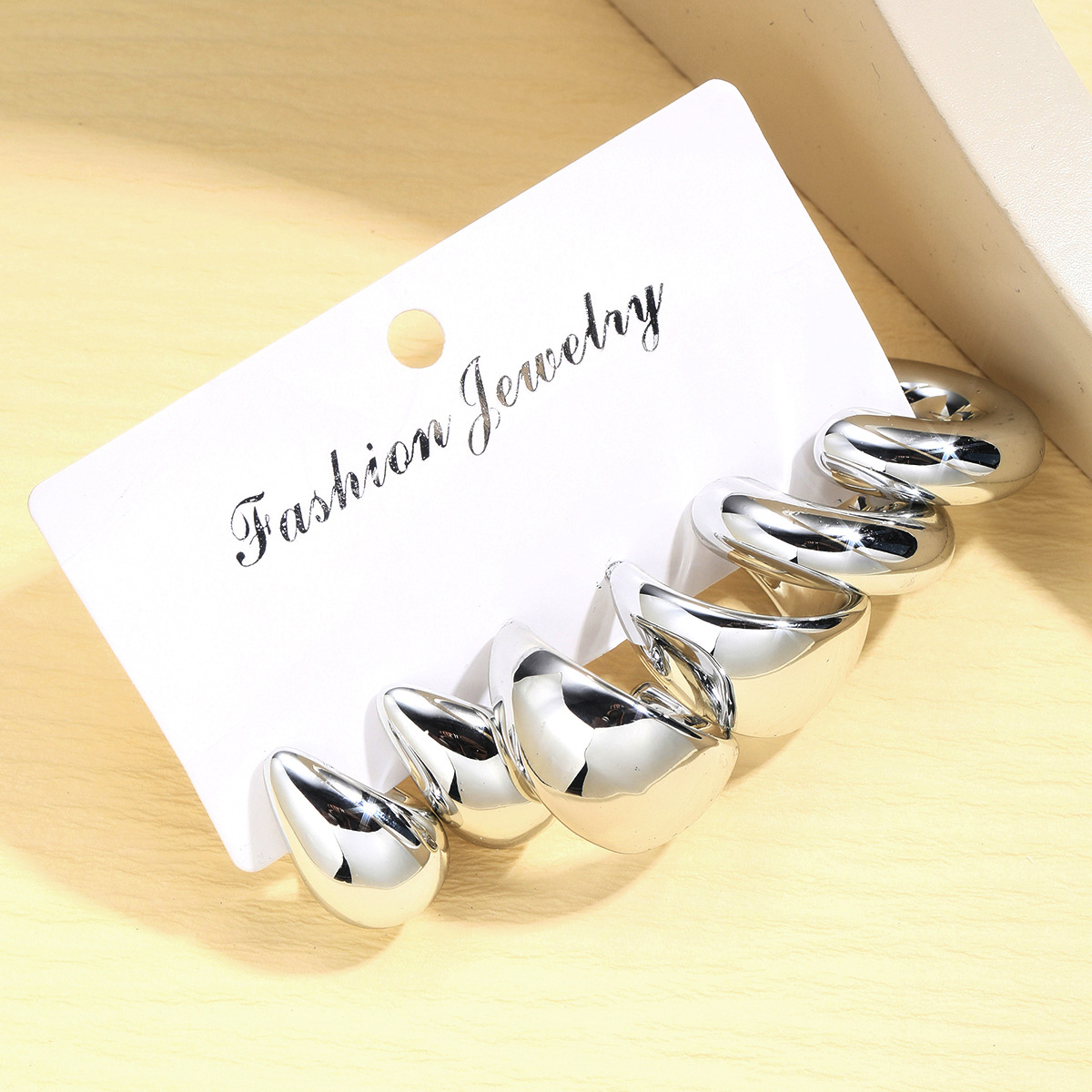A 3-piece set of high-end, creative, retro and simple metal personalized earrings with a touch of style from Europe and America Application Scenario