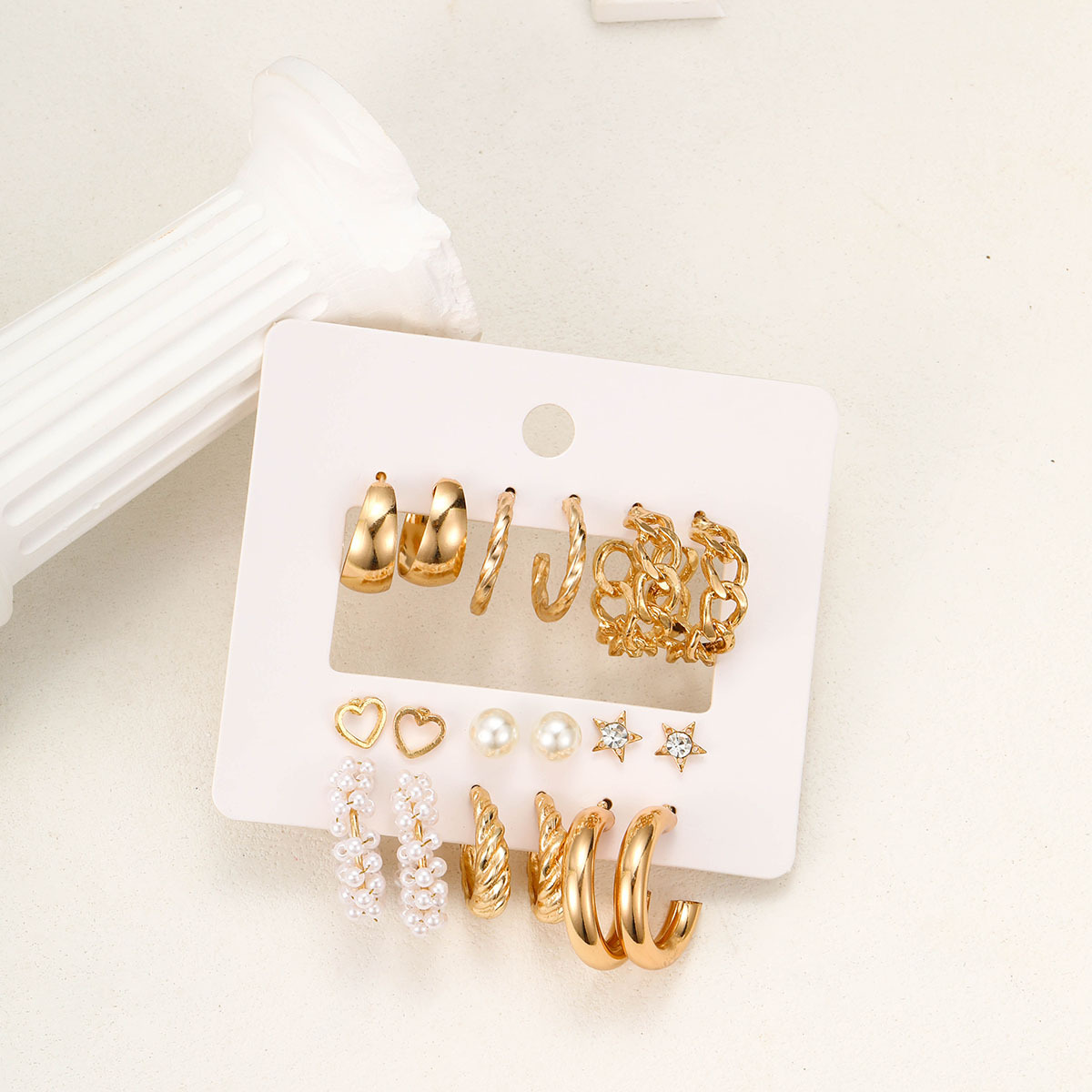 A new cross-border metal twist earring set of 9 pieces, featuring multiple pairs of creative and simple ear rings and geometric earrings Application Scenario