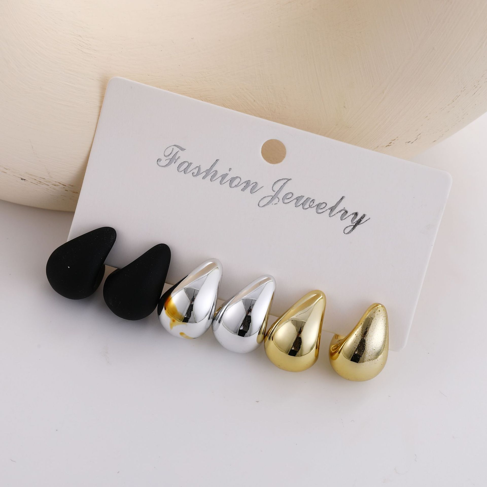 A simple and ins women's earring set of 3 pieces of multi-color, niche mini comma teardrop earrings that are popular across borders from Europe and America Application Scenario