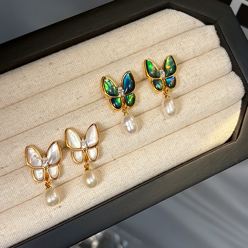 Natural white mother-of-pearl freshwater Baroque pearl earrings for women, light luxury and dazzling style, butterfly stud earrings, high-end earrings full figure
