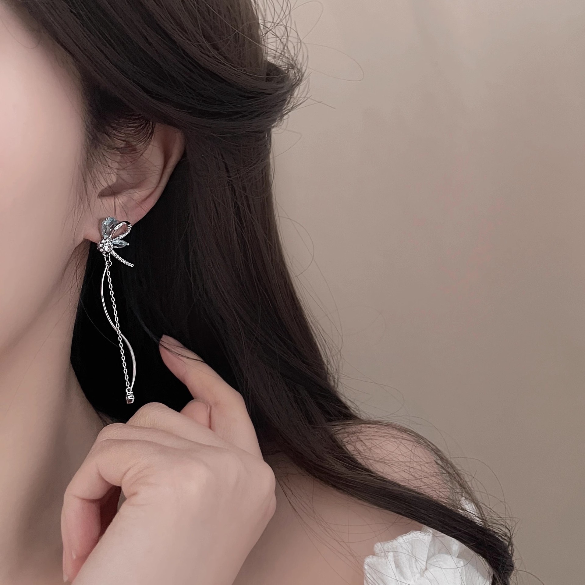 Korean version micro-inlaid long design sense butterfly zircon elegant flower stud earrings on Instagram super fairy-like round face slimming earrings for women details Picture
