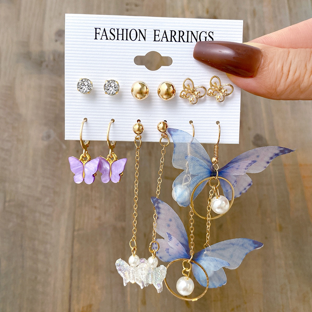 European and American export butterfly earrings, asymmetrical acrylic imitation pearl butterfly pendant earrings set in Instagram full figure