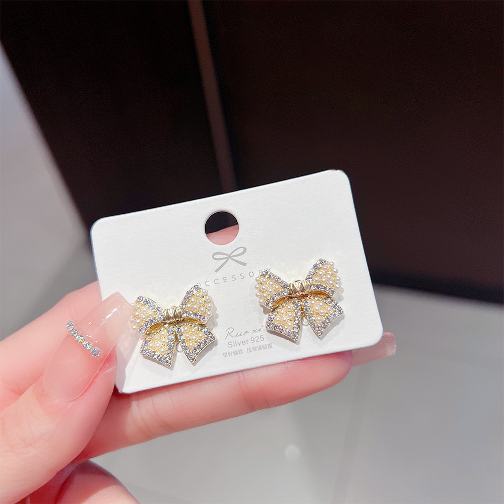 S925 Silver needle bow stud earrings, sweet and fresh, light luxury style ladylike earrings, cold style pearl earrings full figure