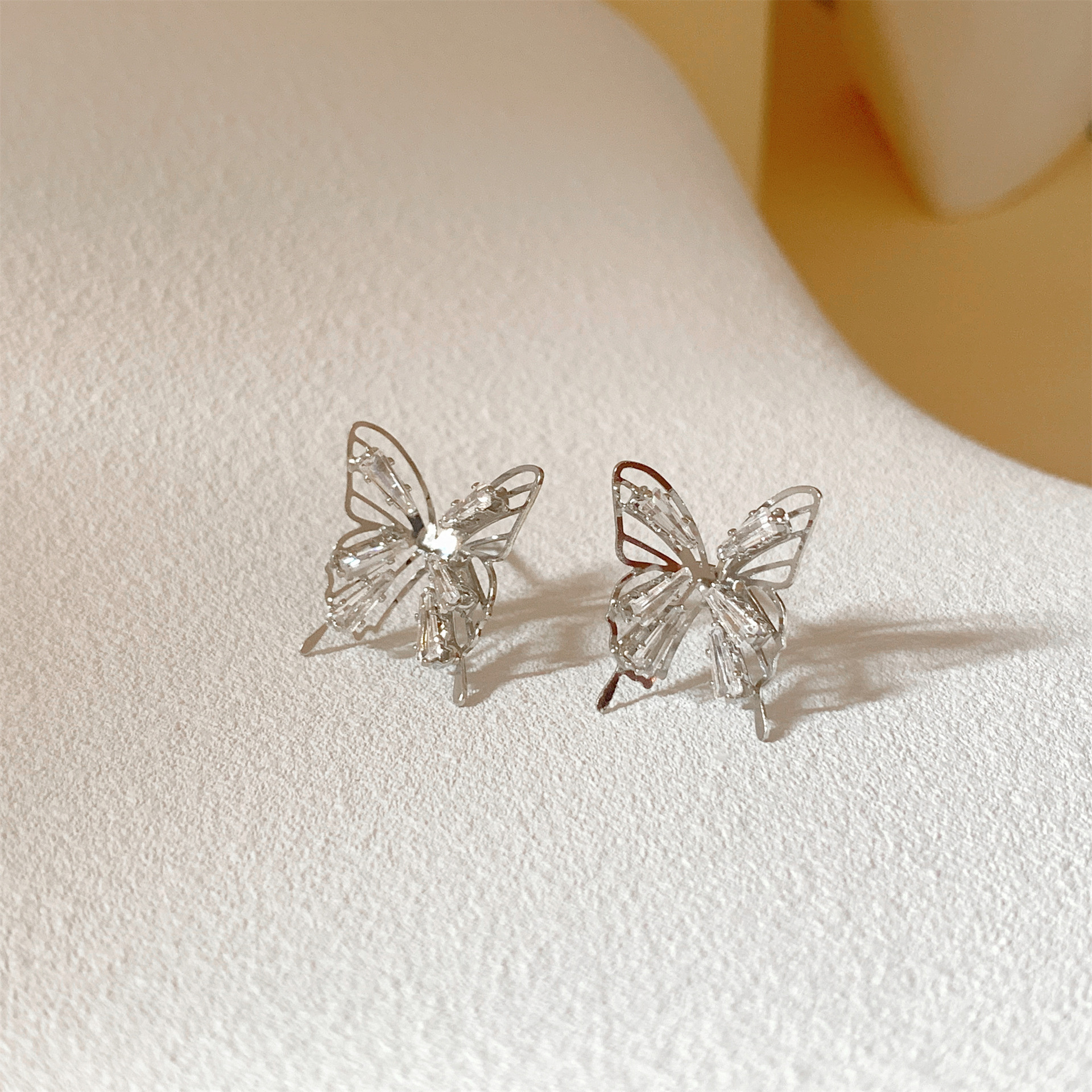 S925 Silver Needle Korean hollowed-out bow Super Flash Zircon, niche style, versatile, high-end design earstud earrings details Picture