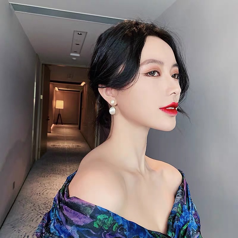 S925 Silver Needle round cat's eye stone earrings, new style earrings, Korean Internet celebrity style women's earrings, commuter style earrings details Picture