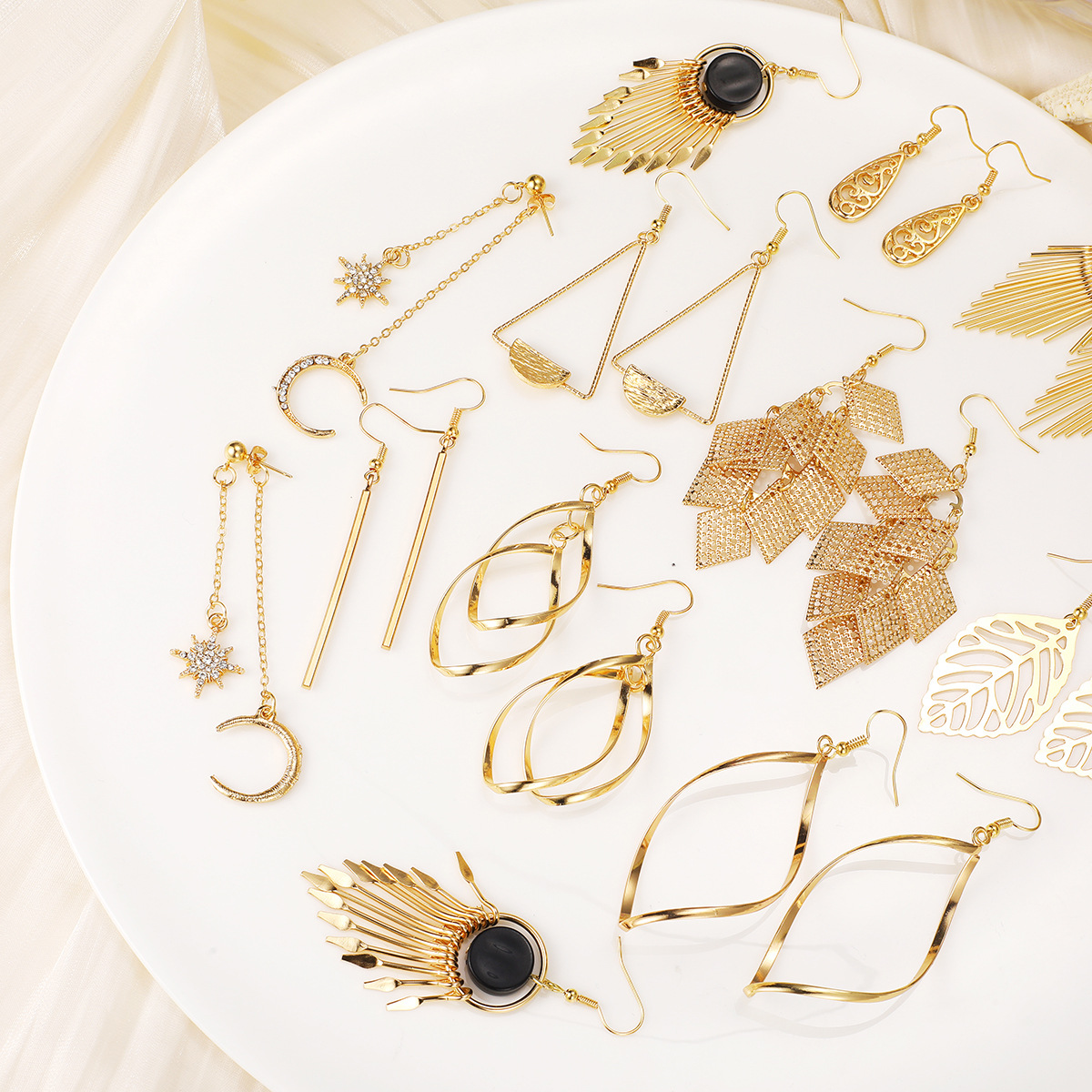 A 16-piece set of cross-border fashion retro leaf butterfly earrings with creative and personalized hollowed-out tassel stud earrings Specification drawing