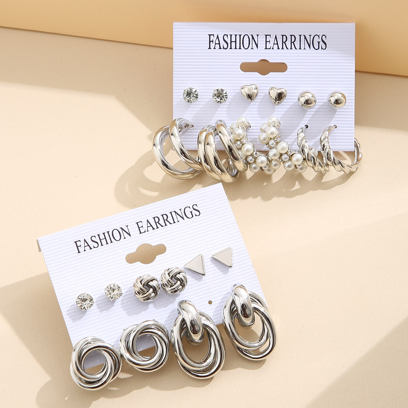 A cross-border bestseller, 11-piece set of high-end three-tube imitation pearl earrings with a European and American style for women's earrings in autumn and winter details Picture
