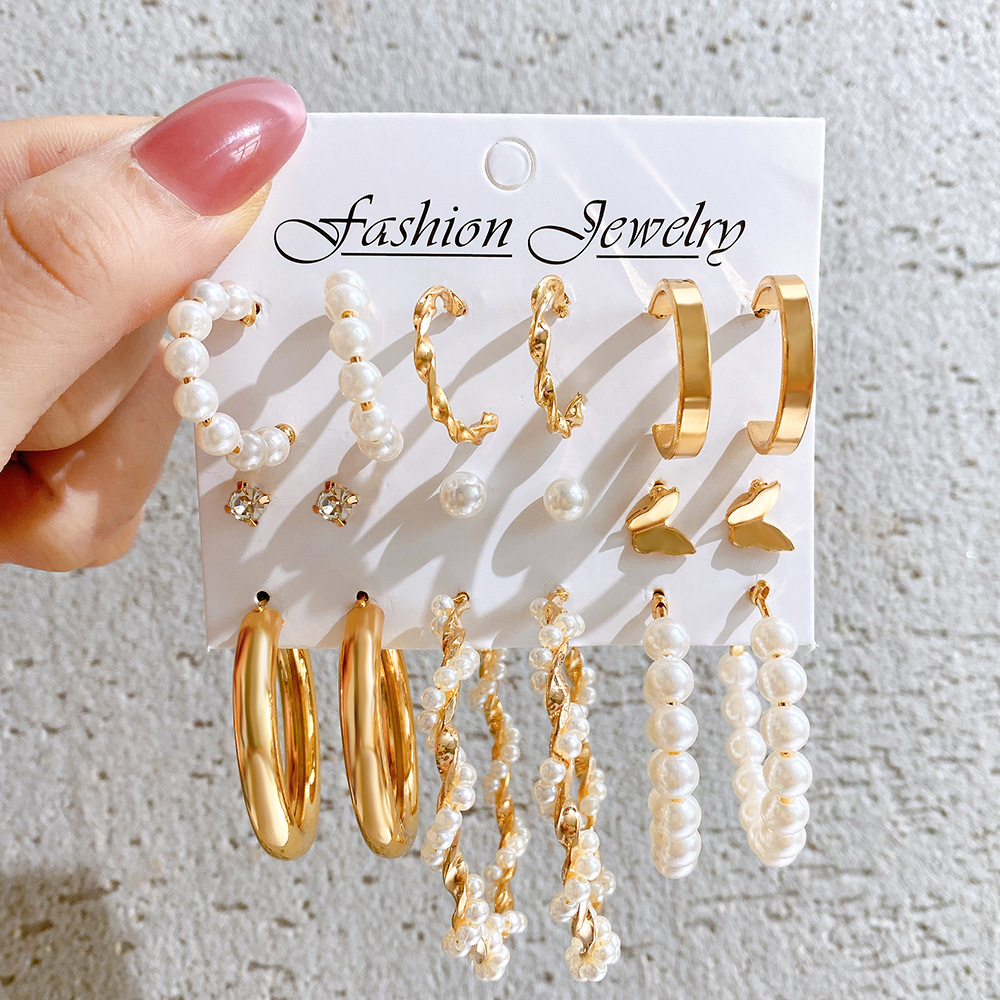 New creative butterfly stud 9-piece set, simple C-shaped earrings, women's wrapped pearl imitation earrings, high-end feel wholesale full figure