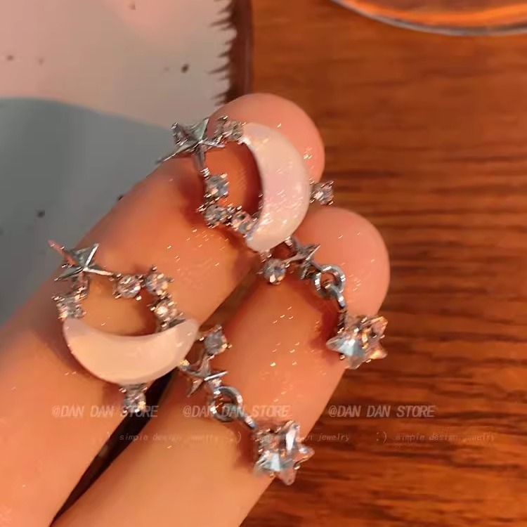 Silver needle, niche, sweet and cool, asymmetrical earrings, high-end design sense, star and moon stud earrings, sweet earrings for women wholesale details Picture