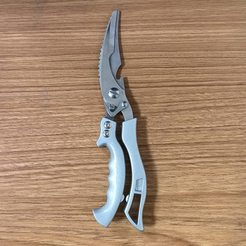 Xinkai kitchen scissors, a household stainless steel multi-functional bone-cutting tool, is specially designed for killing fish, barbecuing meat, and powerful chicken bone cutters undefined