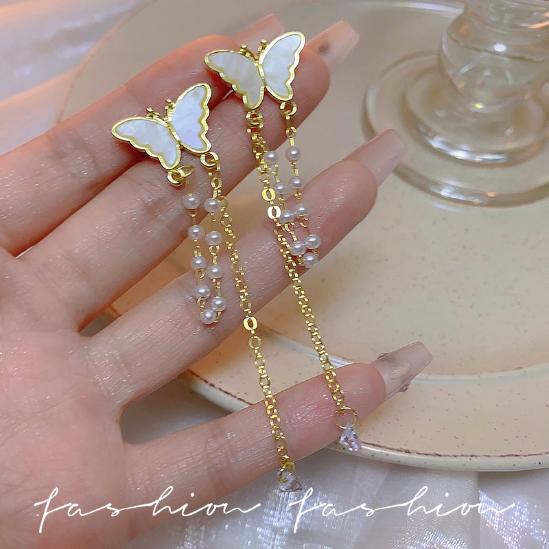 Super fairy-like mother-of-pearl butterfly pearl tassel earrings, with a unique and versatile design, long silver needle stud earrings, and slimming and face-enhancing earrings full figure