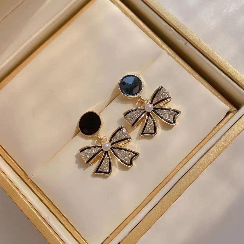 Korean black bow earrings with diamonds, exuding a light luxury vibe, and featuring a Hong Kong-style, niche design details Picture