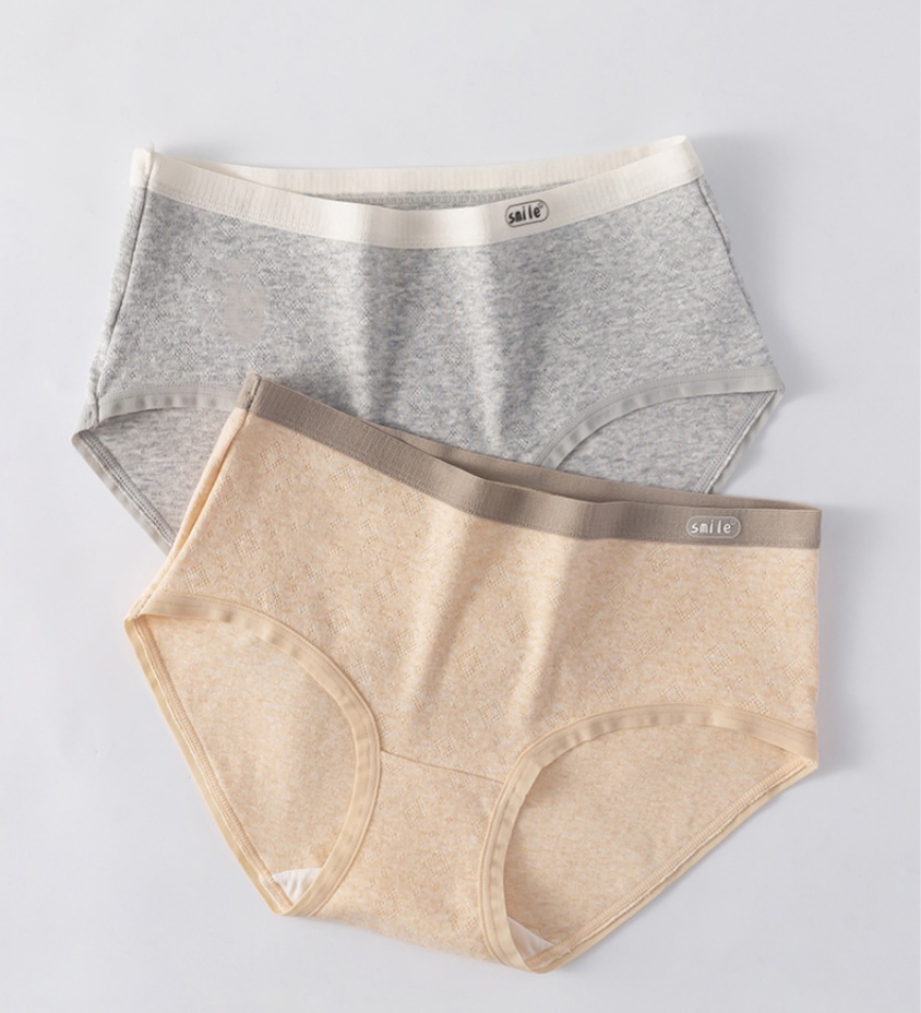 Cloud-like woven strap, seamless women's cotton mid-waist, comfortable and breathable cotton base, contrasting color jacquard breathable triangular underpants Application Scenario