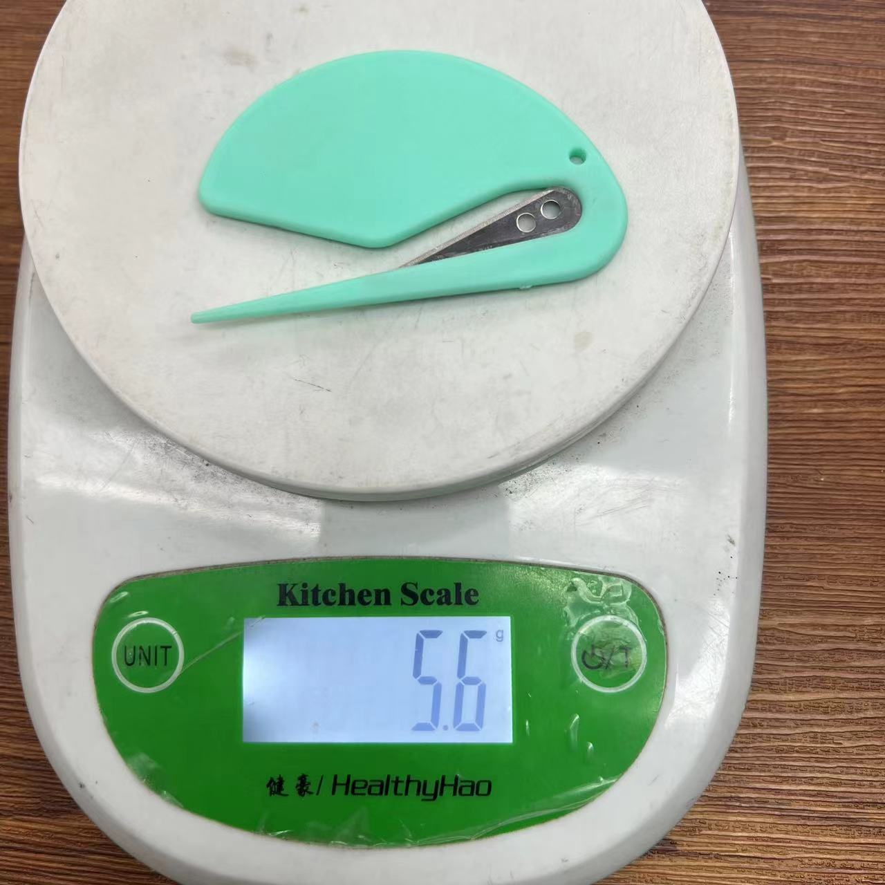 Plastic mini letter opener, simple box opening knife, paper cutter, utility knife, kitchen intestinal cleaner, rubber band and wire cutter Item Picture