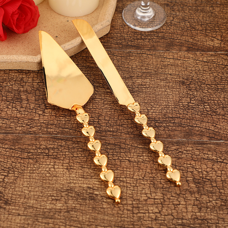 Factory direct supply of European-style golden knife and spatula sets, Western banquet knife and spatula combinations, cake and pizza knife cutting supplies full figure