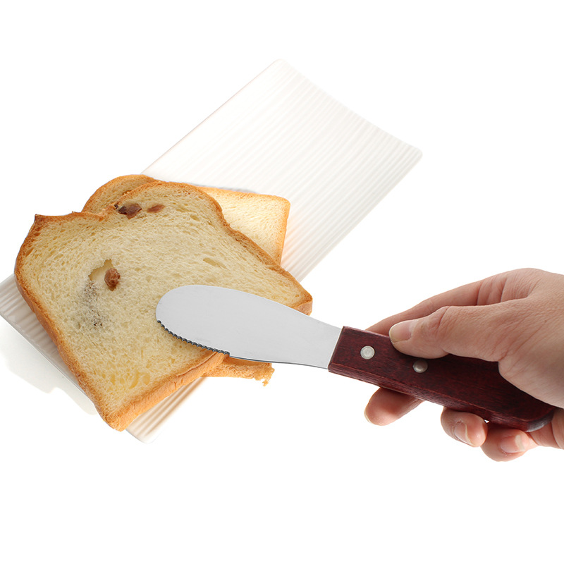 In stock: Stainless steel, wooden-handled, serrated cheese knife, cheese knife, butter scraper with a smooth texture, cheese knife details Picture