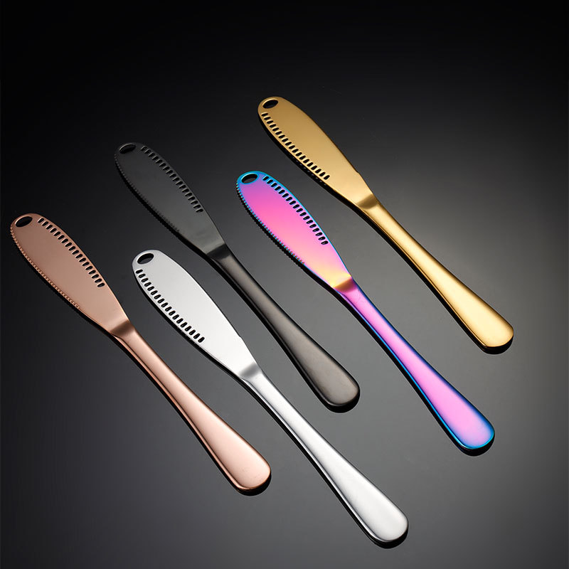 Ain stainless steel cheese knife with round holes, creative design, multi-color titanium-coated cross-border cream knife, baking gift tool full figure