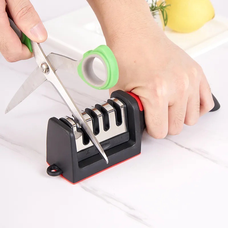 A household multi-functional kitchen knife and scissors knife sharpener, a four-section stone popular quick knife sharpener frame, a sharpening tool Specification drawing