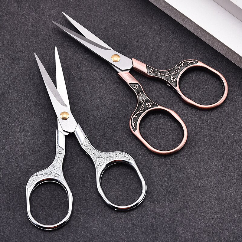 Yangjiang knife and scissors, stainless steel household scissors, plum blossom scissors, square handles, embroidery student scissors, office and document scissors Application Scenario