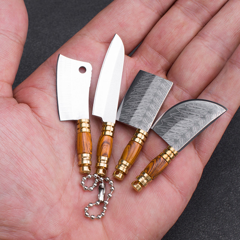 Mini knife with wood-grain handle and laser pattern, sharp, portable keychain pendant, small knife for opening packages and boxes full figure