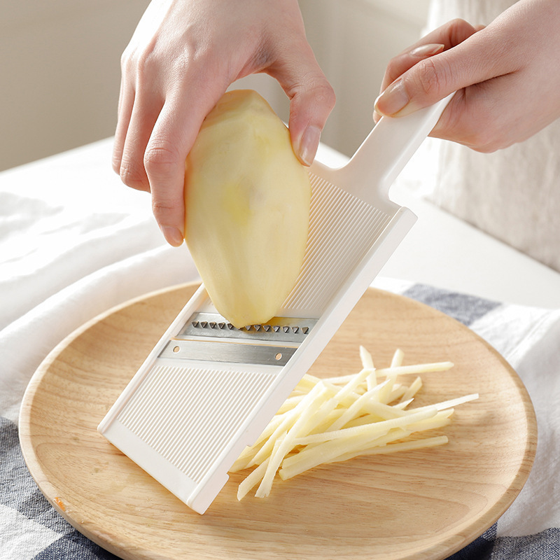 The Japanese ECHO grater is a multi-purpose household device for slicing potatoes, grilling, and inserting fruits and vegetables details Picture