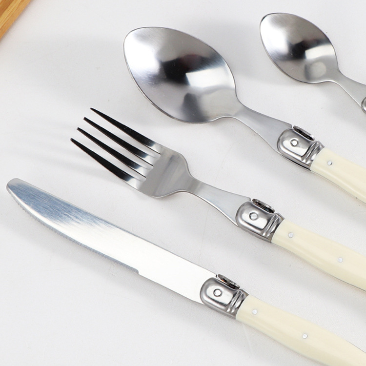 Household knife, fork and spoon set, milky white plastic handle, steak knife, steak fork and spoon, stainless steel tableware Application Scenario