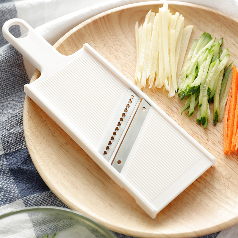 The Japanese ECHO grater is a multi-purpose household device for slicing potatoes, grilling, and inserting fruits and vegetables full figure