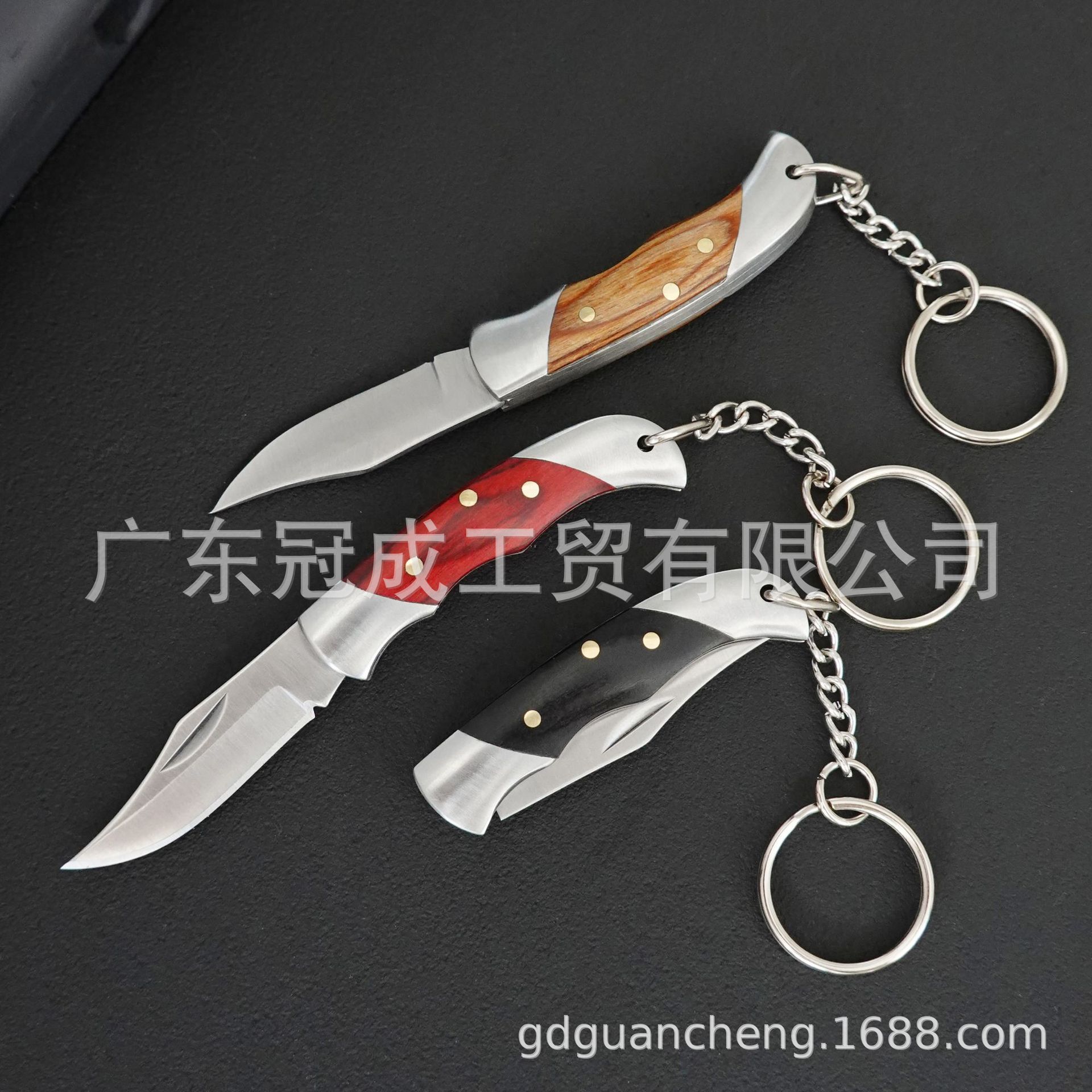 Factory direct supply of color wood handle, rust steel keychain, knife, folding knife, practical folding details Picture