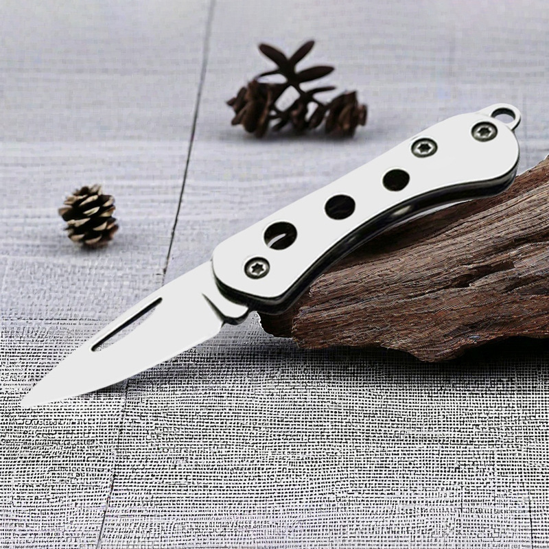 Cross-border thickened outdoor folding knife, portable mini express delivery knife, stainless steel camping knife, household fruit knife Application Scenario