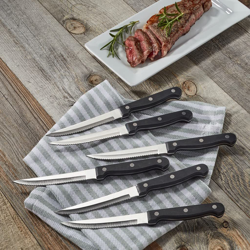 4.5-inch Western-style steak knife from the original manufacturer, cross-border stock, serrated knife, PP black extended handle steak knife details Picture