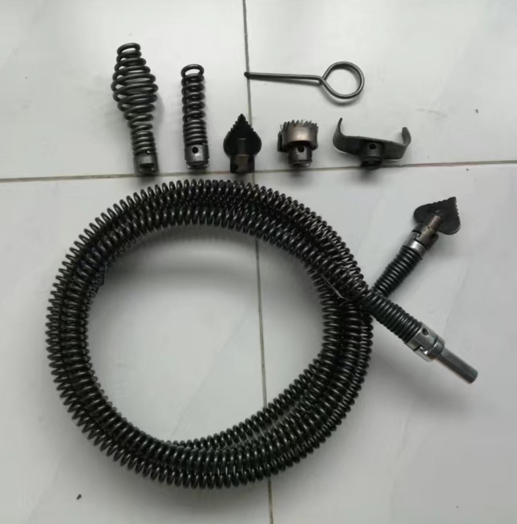 A household sewer unclogging tool, a hand drill, 12mm spring for unclogging pipes undefined