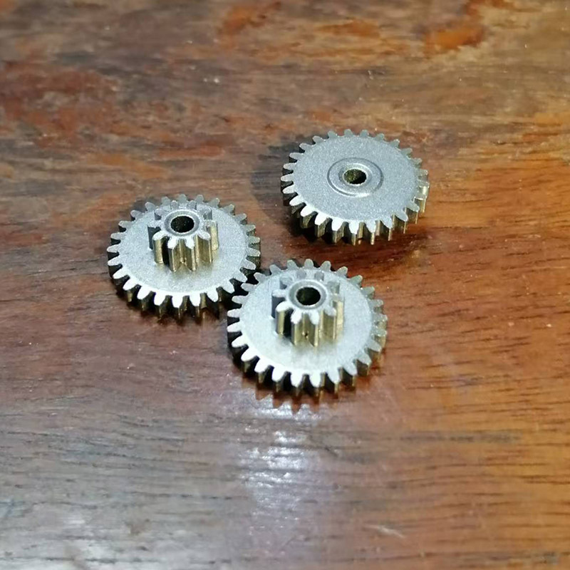 A brand-new 0.5-module metallurgical powder double-layer gear with 25+10 teeth and 2mm holes, and a loose double metal pinion Specification drawing