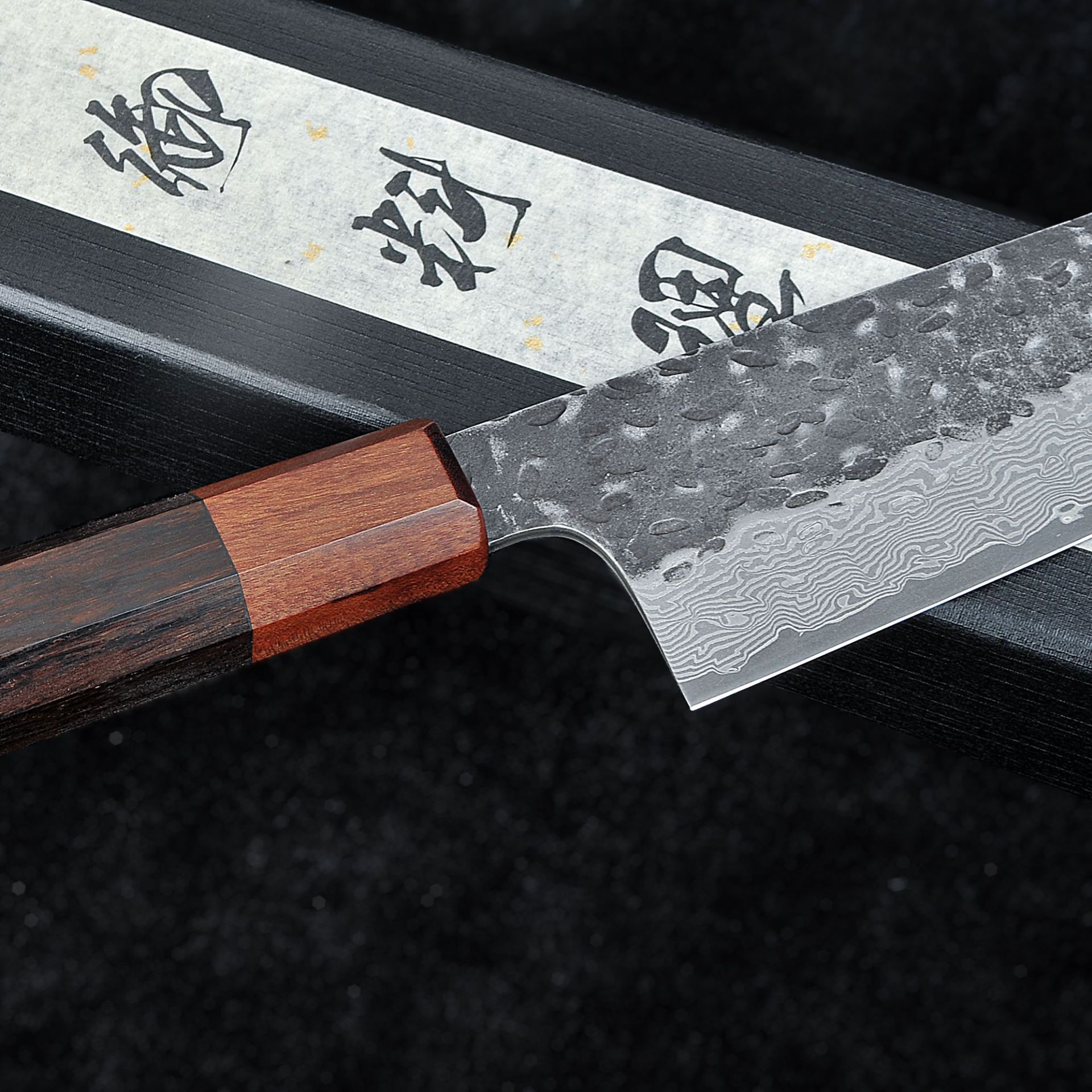 Damascus black hammer pattern octagonal heavy bamboo handle cutting pair knife, Japanese chef knife, kitchen knife, ox knife manufacturer wholesale Application Scenario