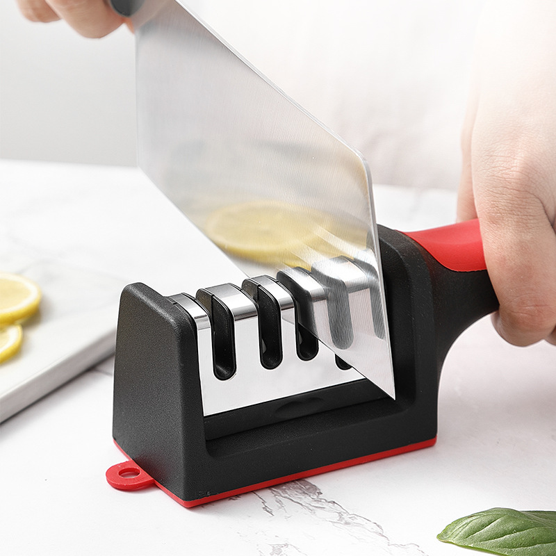 Quick knife sharpener, a household multi-functional knife sharpener, manual whetstone wholesale, three and four sections creative grinding tools full figure