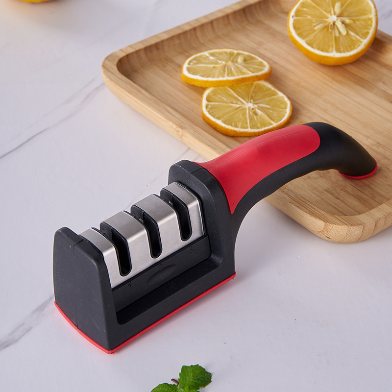Three-section knife sharpener, a popular tungsten steel knife sharpener for home use, a quick sharpening tool for scissors, wholesale whetstones from street stalls Application Scenario