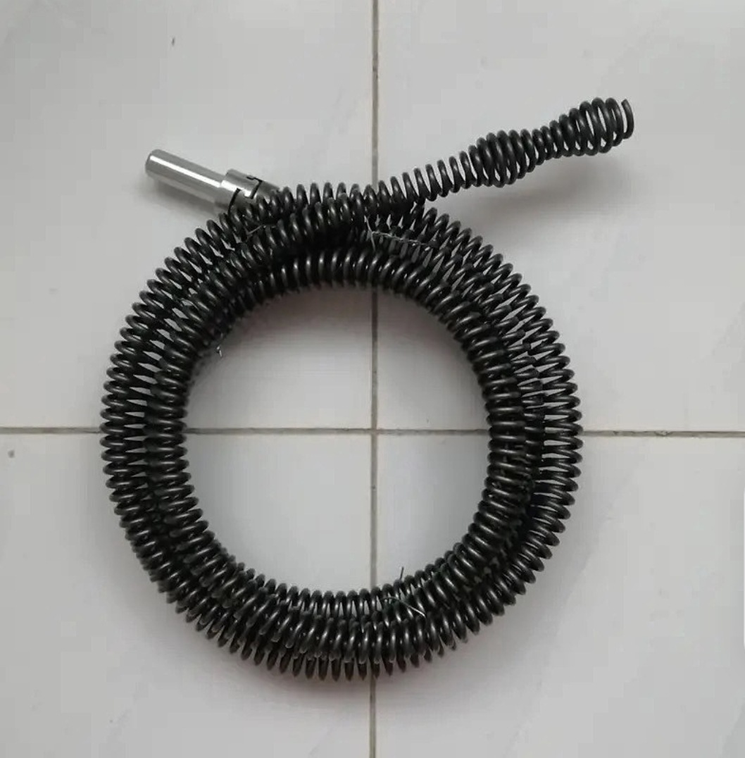 A household sewer unclogging tool, a hand drill, 12mm spring for unclogging pipes undefined